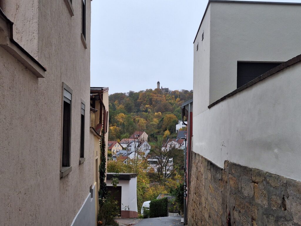 An image looking down the street towards the hill in Bamberg where Altenburg castle is built